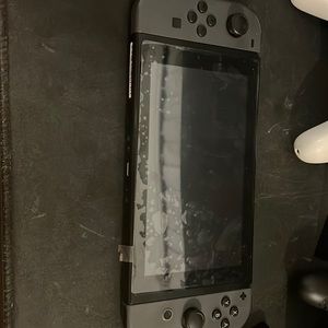 Nintendo Switch Super Smash Bros. Edition: Gray w/ pro controller and steelbook.